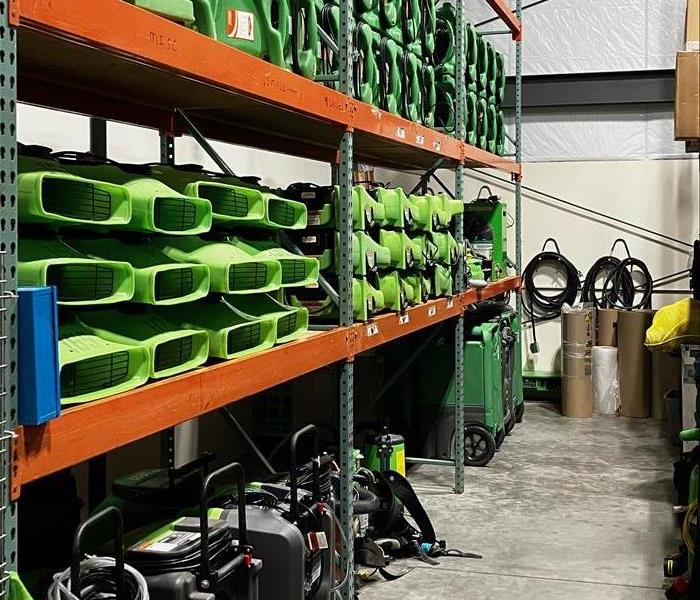 multiple green drying devices shelved in the warehouse